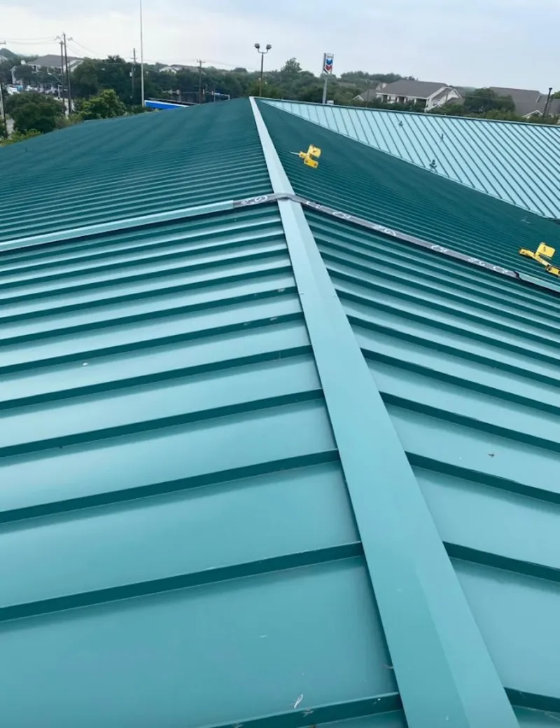 Green commercial metal roof ridge and valley for Metal Roof Repair in North Valley