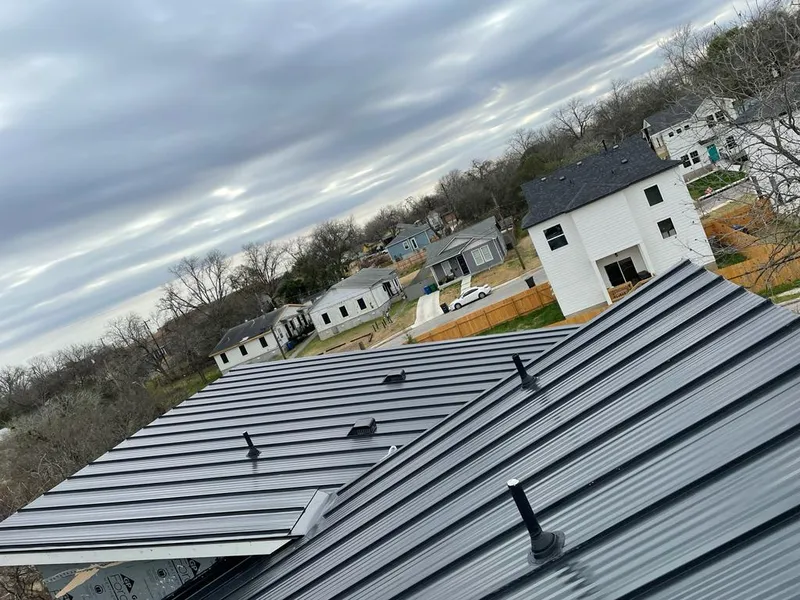 Standing seam metal roof panels with vents for Skylight Repair in North Valley